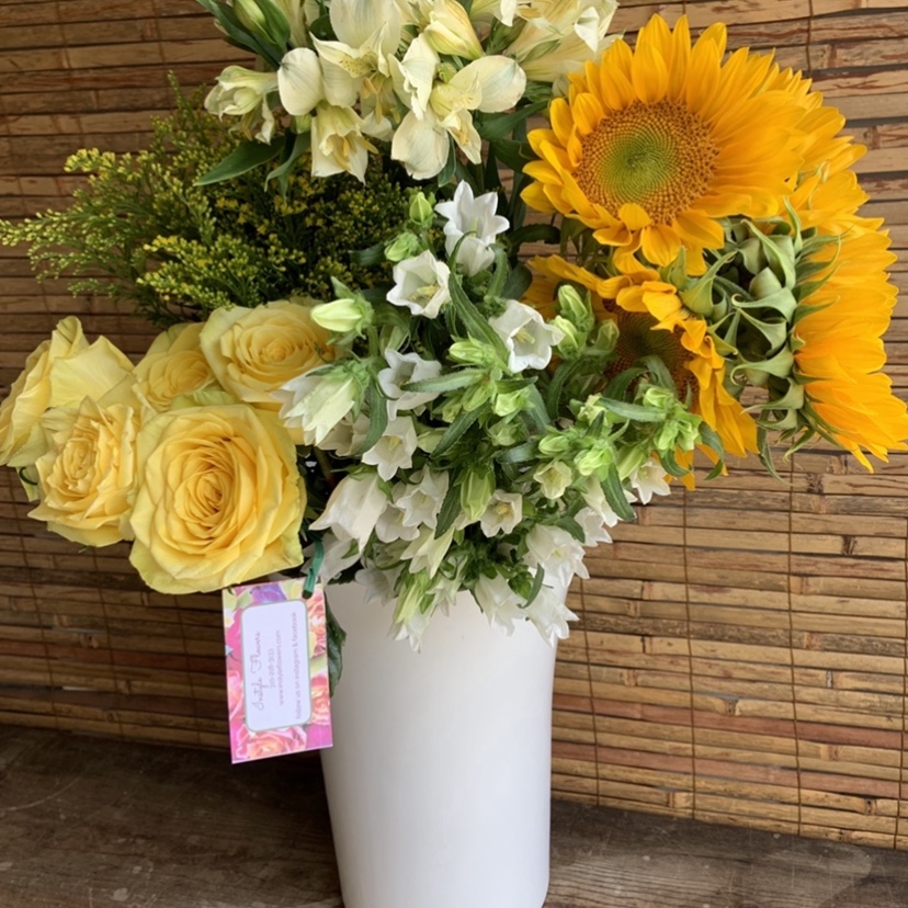 Sunflower and yellow rose bright seasonal arrangement